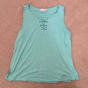 Child large teal tank top.